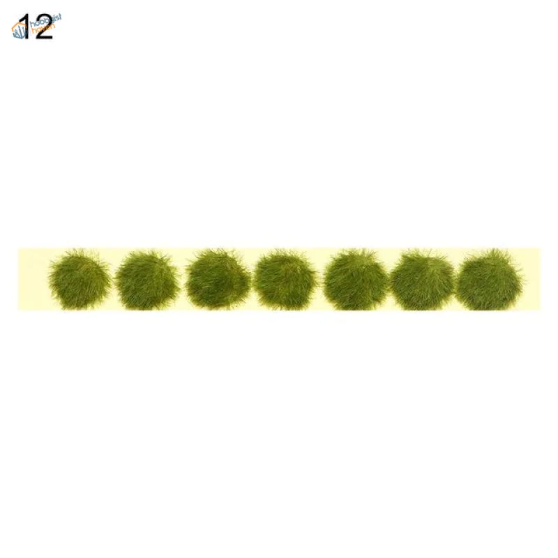 Six green miniature flower clusters in a row
