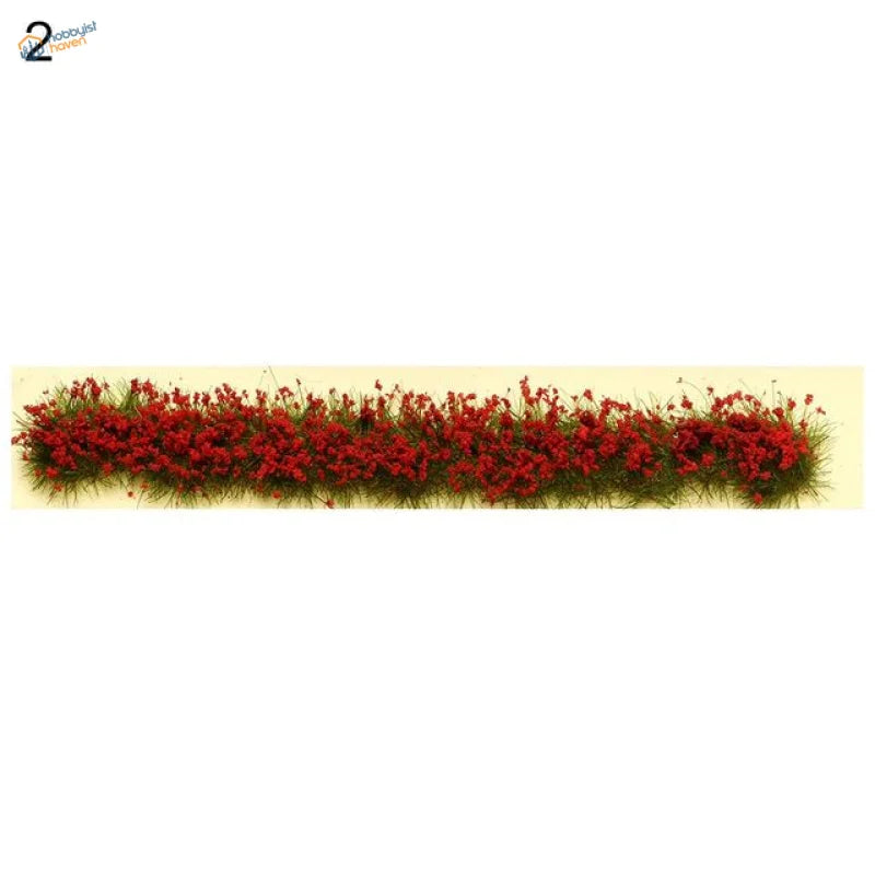 Miniature red flower clusters in dense garden bed layout