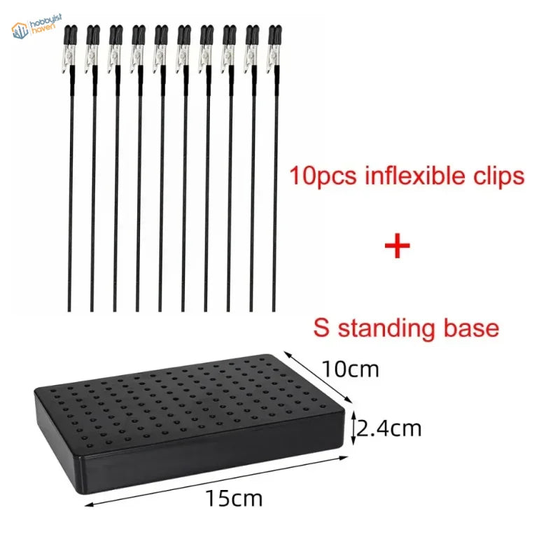 Black plastic standing base with grid holes for model painting clip and magnetic alligator clips airbrush holder