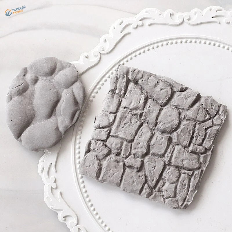 Gray concrete stone silicone molds for scale modeling rocks and bricks