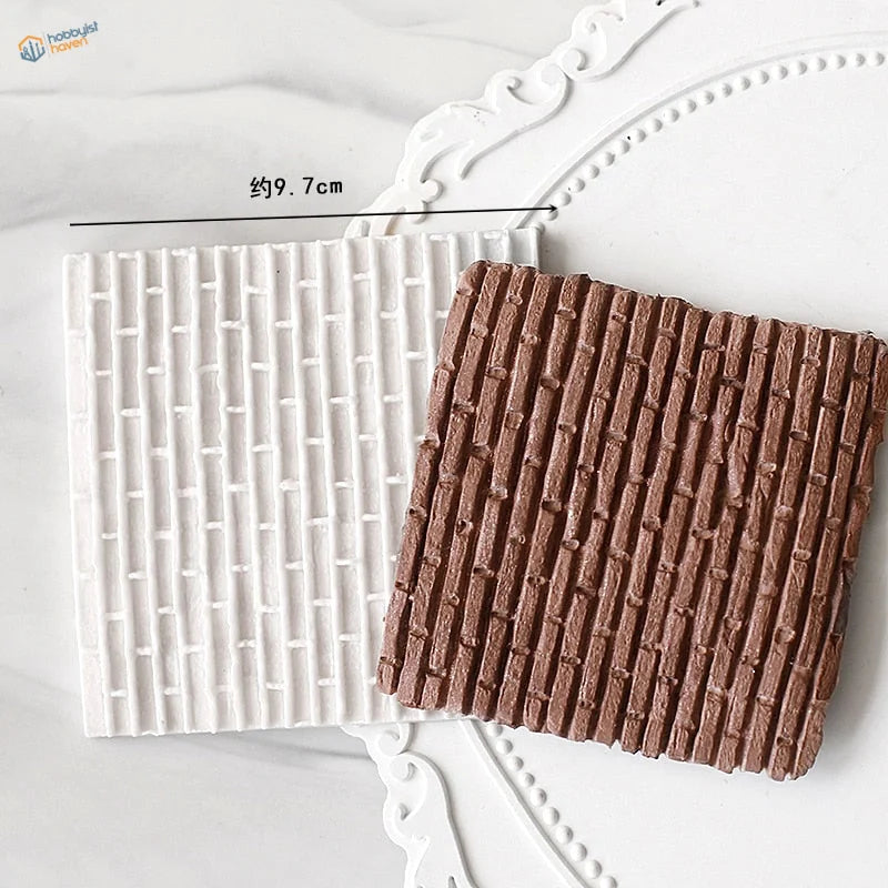 Brown and white silicone molds for scale modeling rocks and bricks on tray