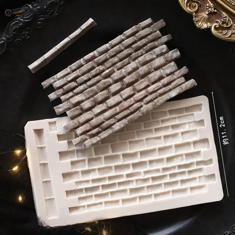 White silicone brick wall mold with gray textured faux-brick pieces for scale modeling