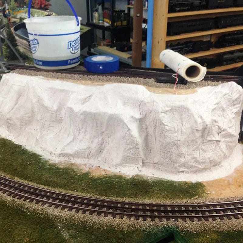 White textured mountain diorama made with mountain making plaster cloth