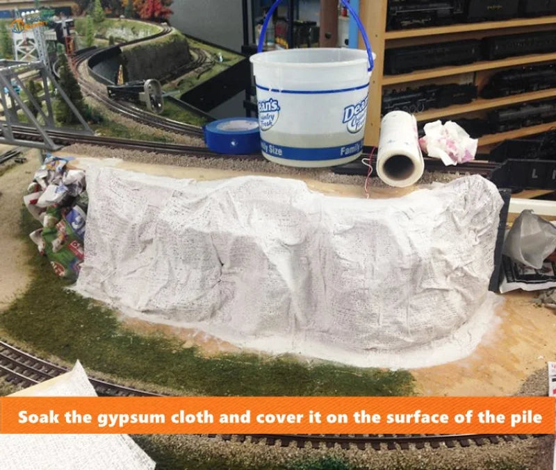 White textured gypsum cloth draped over mountain making plaster cloth mound