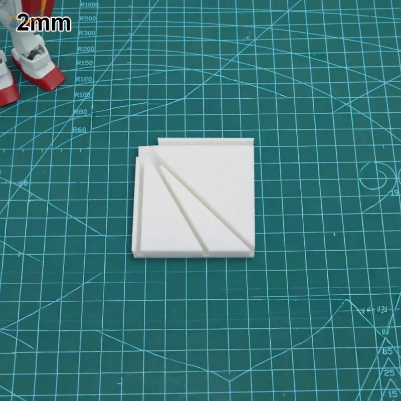 White 2mm thick plastic gluing jig part with diagonal grooves for scale modeling tools and model building tools