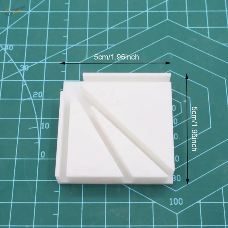 White plastic 3d-printed square corner gluing jig with diagonal grooves for model building tools and scale modeling tools