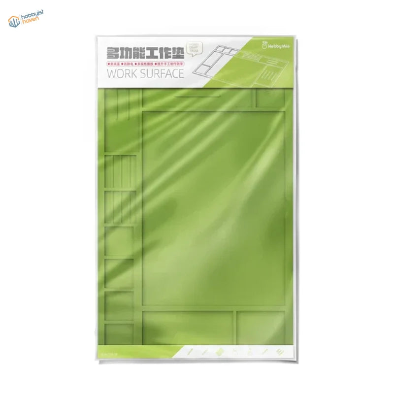 Green translucent durable silicone work pad with molded compartments