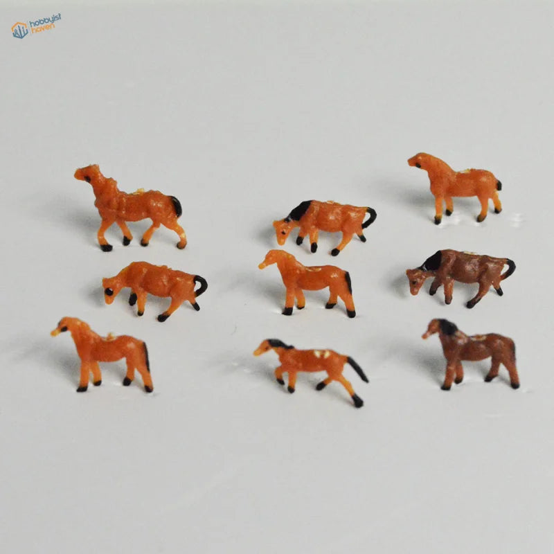 N scale 1:150 model painted miniature horses in orange and brown
