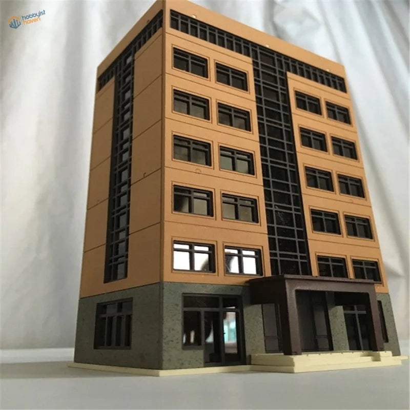 Tan and black N scale building model with detailed windows for railroad scenery