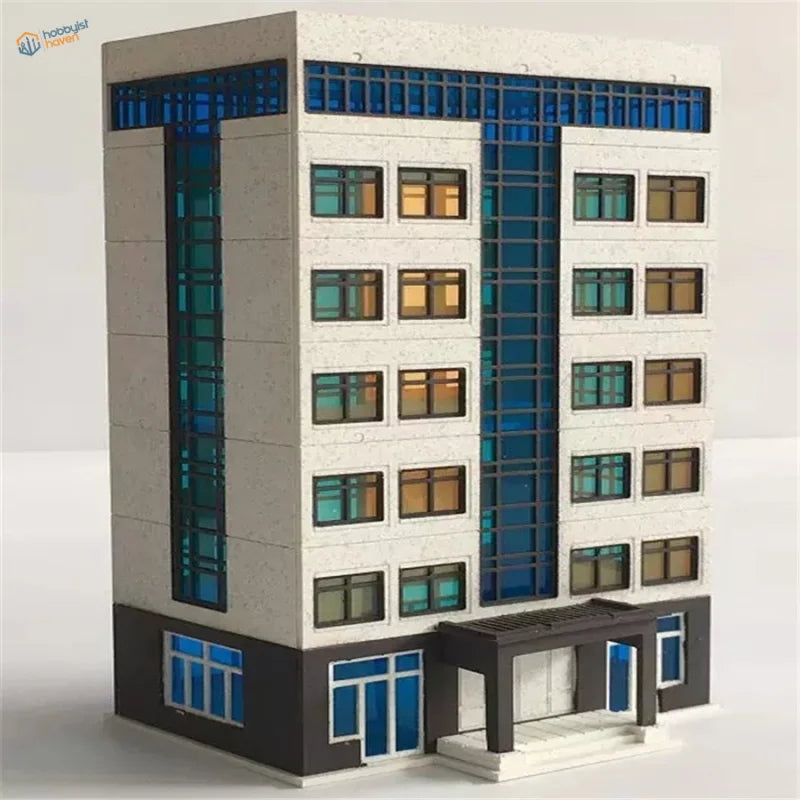 N scale building model with white blue design, gray base, green amber windows for railroad scenery