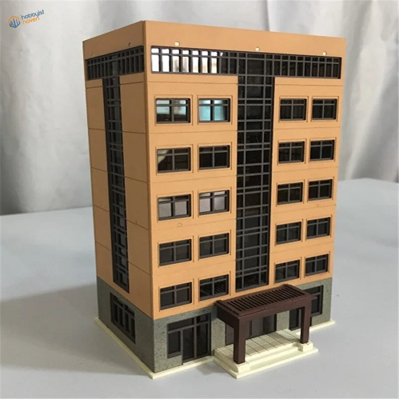 N scale building model in tan and black with detailed windows for railroad scenery
