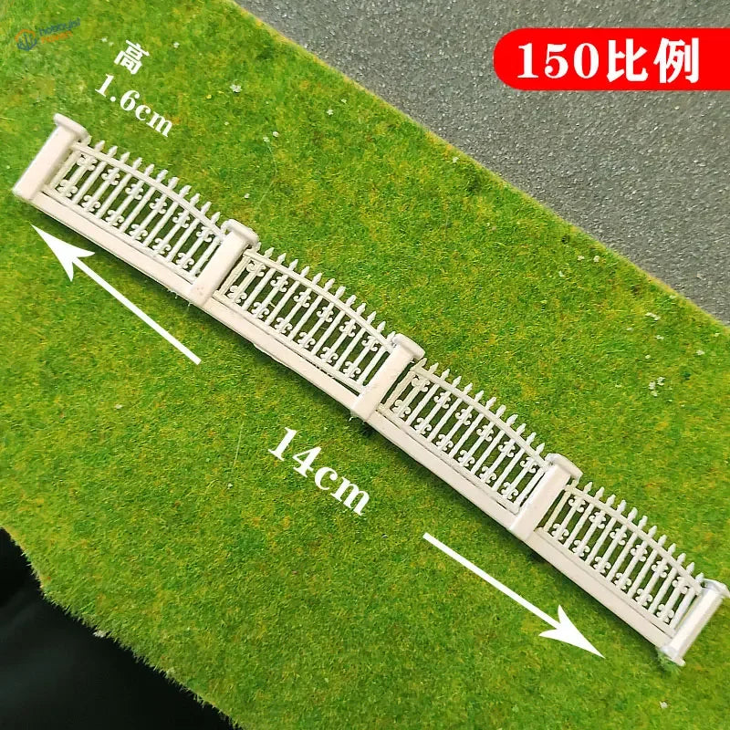 A 1:150 scale decorative fence set featuring white abs plastic ornate wrought iron spindles and pillars
