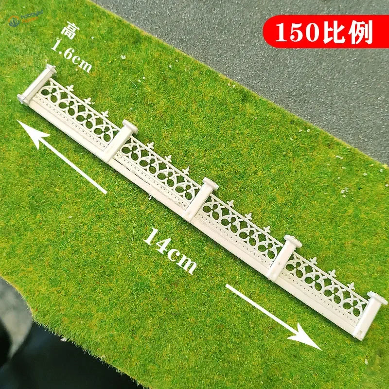 White abs plastic n scale decorative fence with intricate lace-like patterns and vertical pillars for model gardens