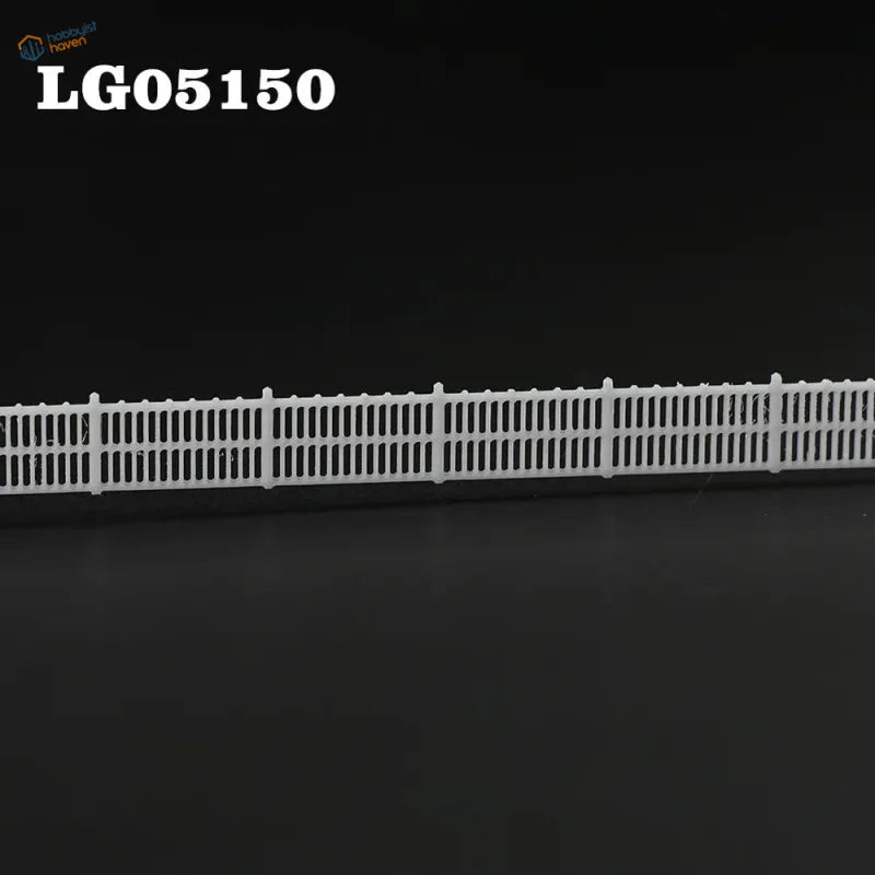 N scale white plastic picket fence wall with vertical slats and lattice-top posts for station platform use 1 metre set
