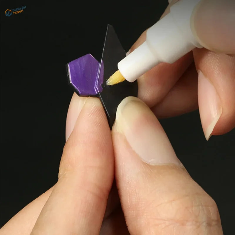 Applying purple hexagonal plastic piece with glue for DSPIAE soft tipped acrylic pens