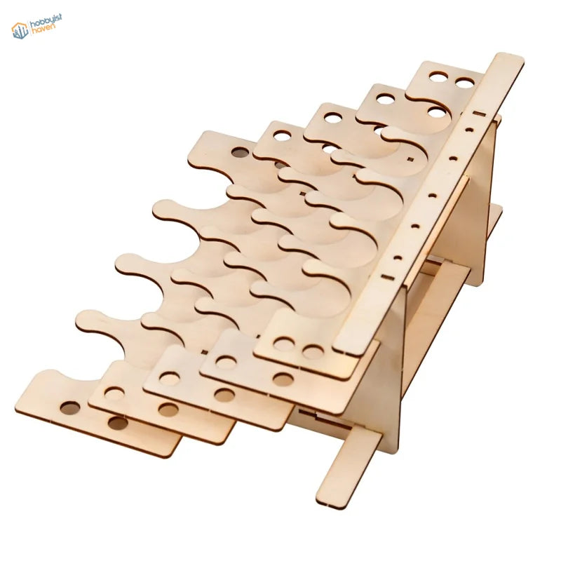 Light brown wooden rack for paint bottles, mixing cups, scale modeling tools