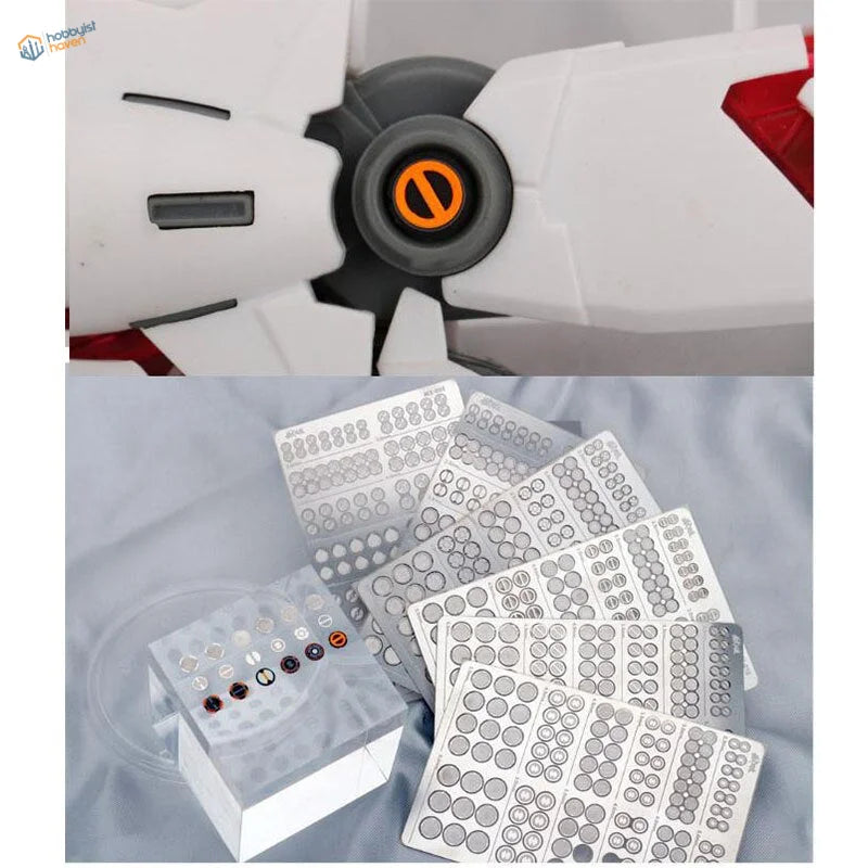 White and red Gundam model with photo etch round plates orange symbol