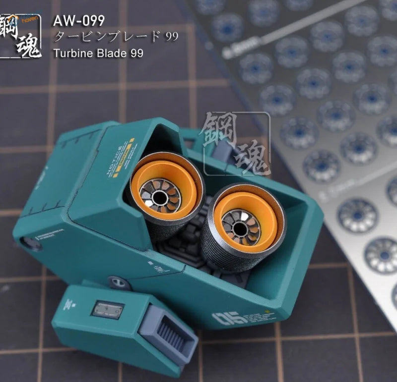 Teal photoetch Gundam turbine blades model with orange silver components