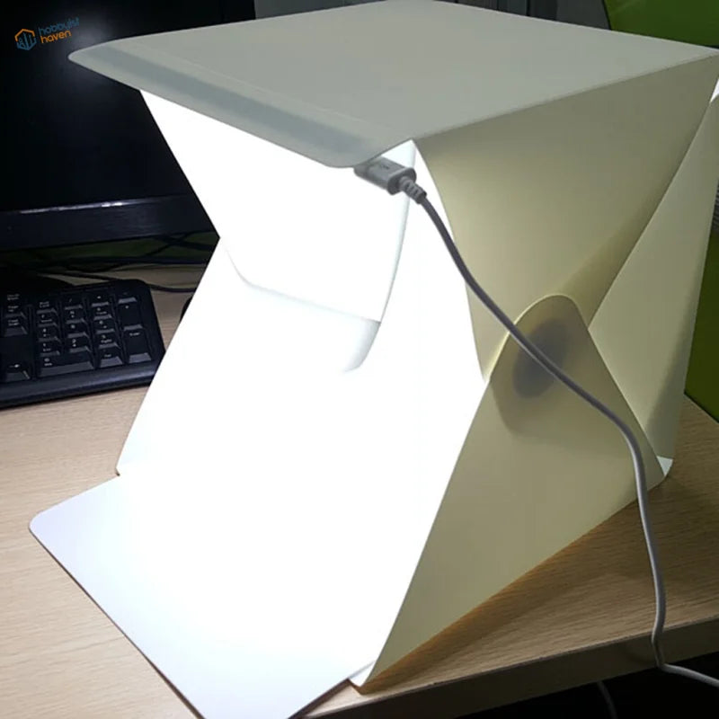 White portable LED lightbox with foldable design and power cord