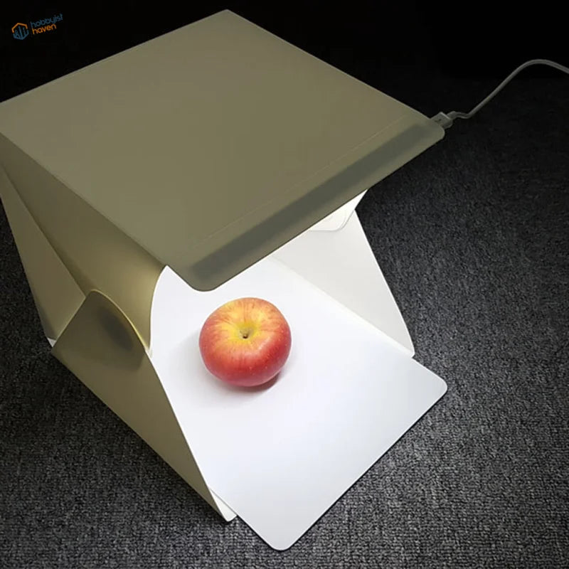 Beige portable LED lightbox with white foldable interior panels