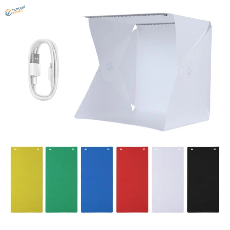 White portable LED lightbox with foldable studio and six color-changing backdrops