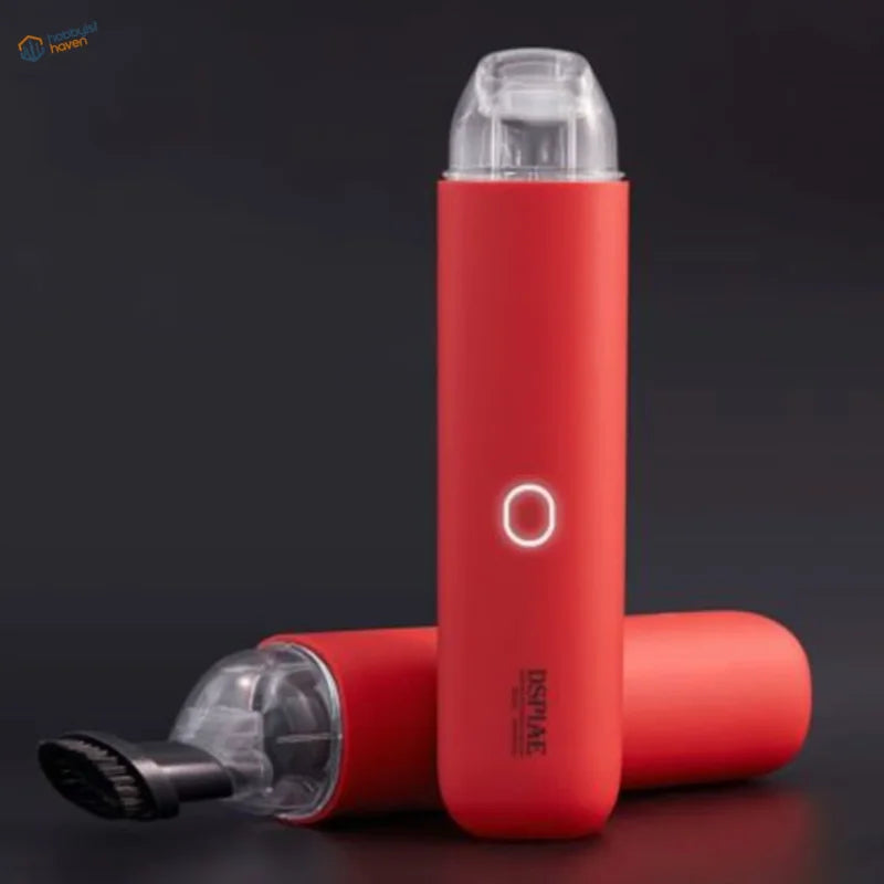 Red portable wireless vacuum cleaner with transparent top and brush