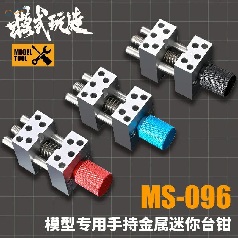 Precision micro vise for scale modelling with silver body and red blue knobs