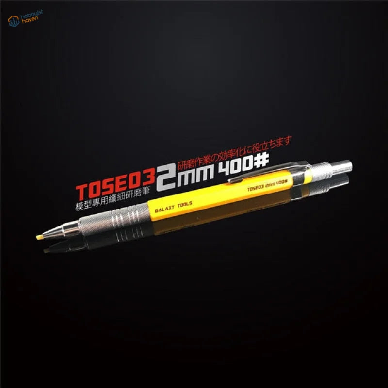 Yellow and silver Galaxy Tools precision sanding stone pen