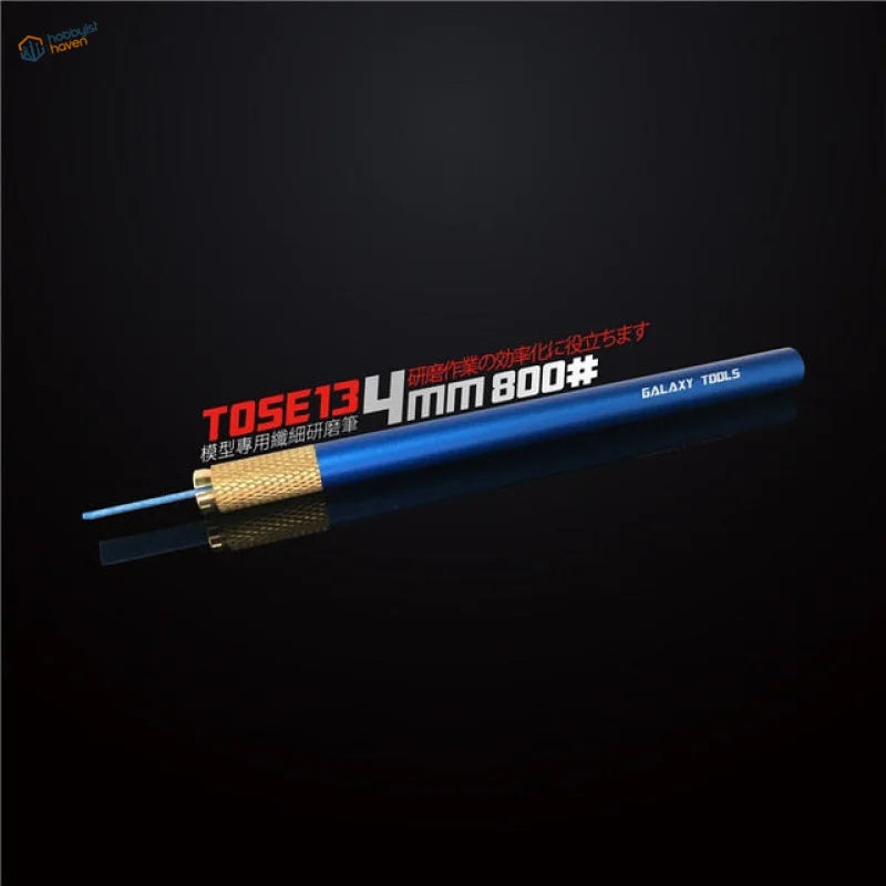 Precision sanding stone pen with blue body and gold grip