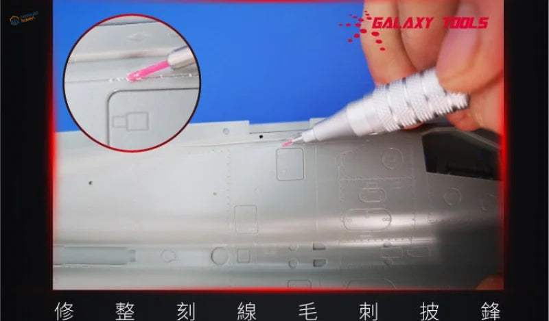 Precision sanding stone pen with silver marker and pink tip on metal