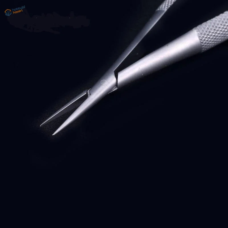 Silver precision tweezers with textured grips for photo-etched scale modeling parts