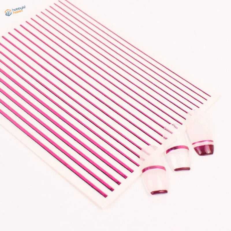 Pink metallic stripe stickers on white sheet with purple acrylic nail tips