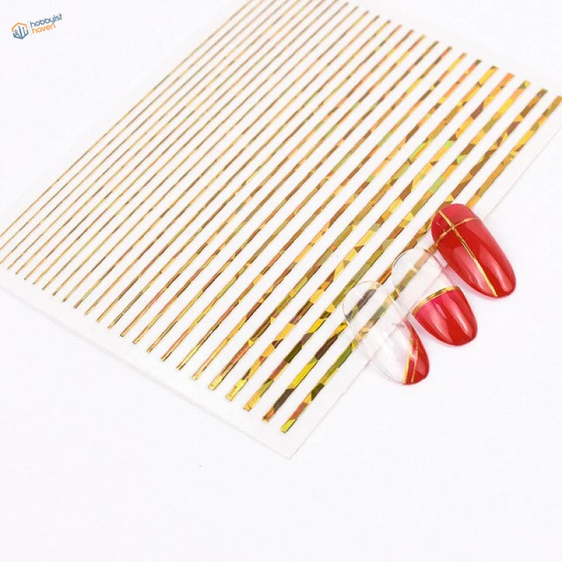 Gold foil stripe stickers on clear sheet with red nails for scale modeling