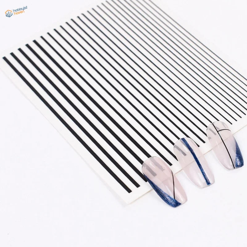 Self-adhesive black white stripe stickers on clear sheet with blue glitter nails