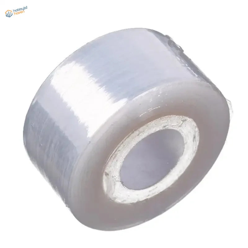Clear masking tape roll with white core for scale modeling tools