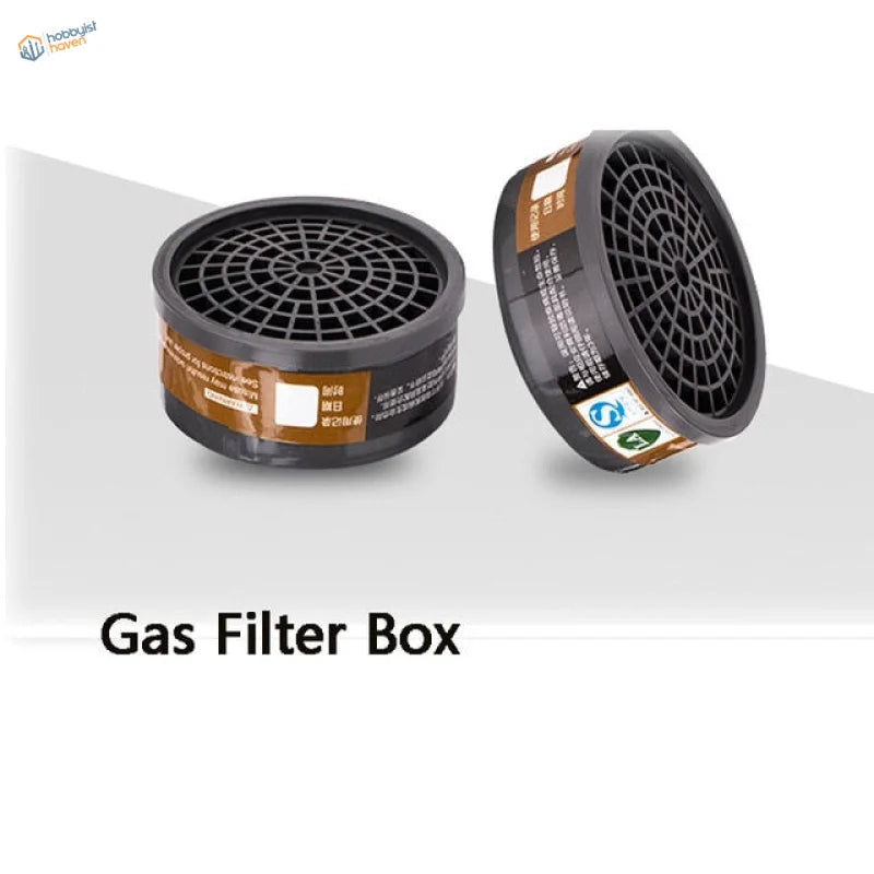 Black cylindrical gas filter cartridges for face dust mask
