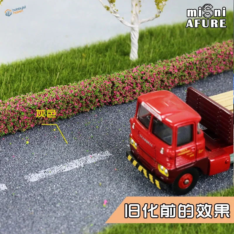 Red die-cast vintage flatbed truck with simulated asphalt stickers