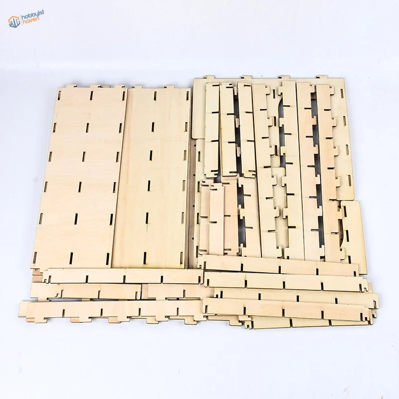Light-colored wooden puzzle pieces in small parts organizer rack