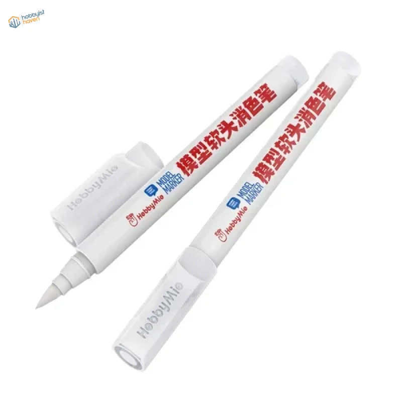 White plastic Soft-tipped Panel Liner Cleaner pens with red blue branding