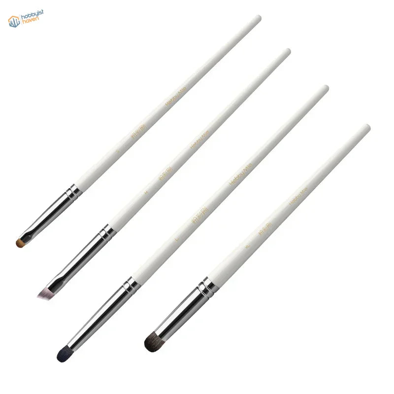 Set of four soft weathering brushes with white handles and silver ferrules