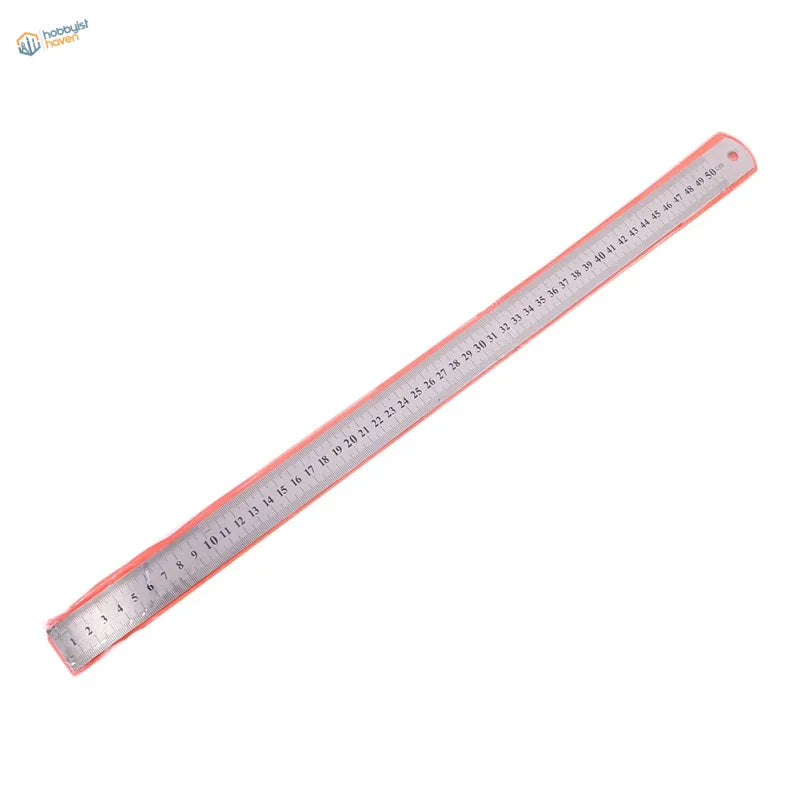 A sleek stainless steel ruler with a pink plastic edge and clear black measurement markings for scale modeling