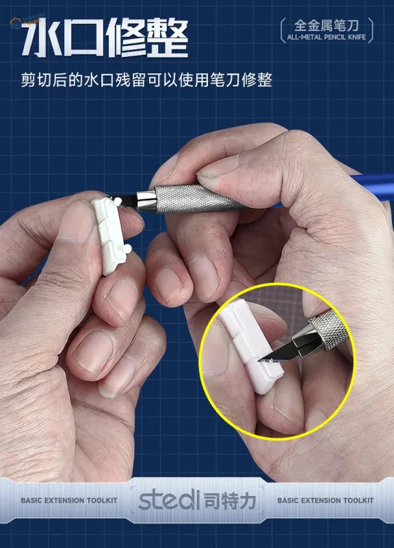 Silver all-metal pencil knife from Stedi Modelers Toolset trimming white plastic
