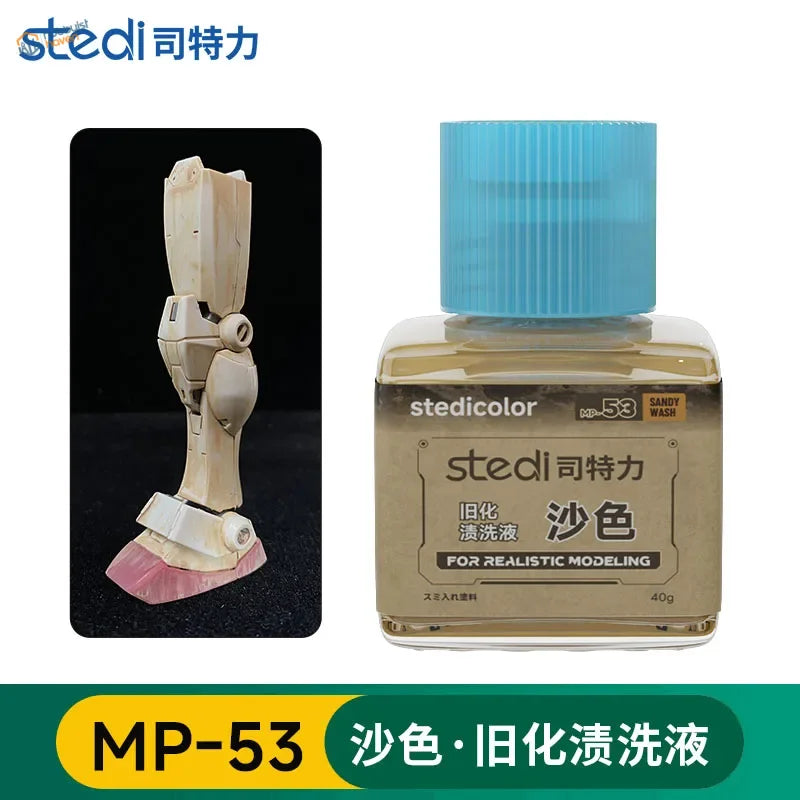A translucent bottle with light blue ribbed cap contains stedi weathering wash mp-53 sandy wash for scale models