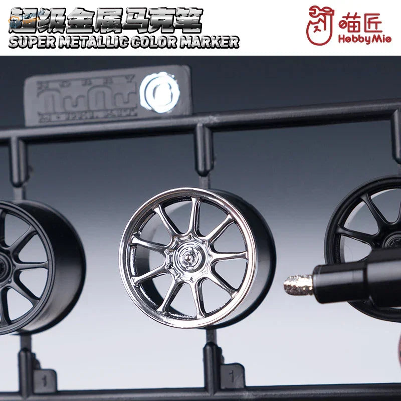 Chrome-finished multi-spoke model car wheel on tray for Super Metallic Marker Pens