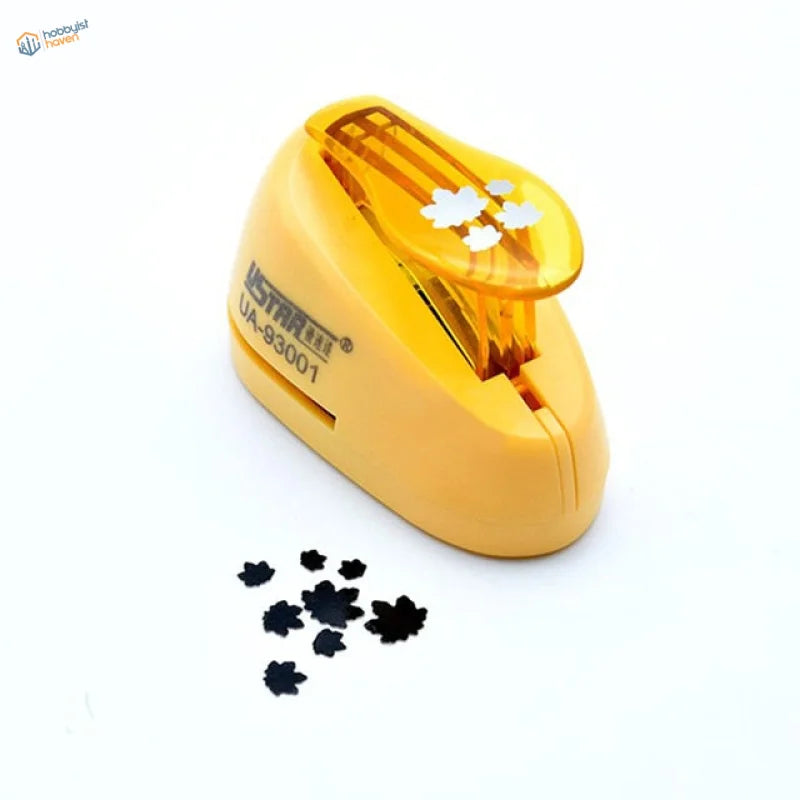 UStar tree leaf maker with yellow punch, clear top and black cutouts