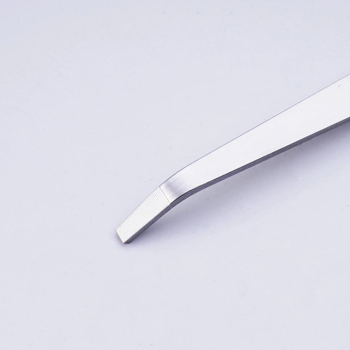 Silver-toned precision angled file tweezers with curved flat tip