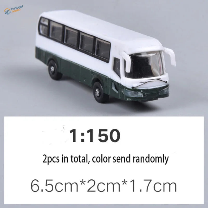 White and dark green 1:150 scale miniature bus for scale railway modeling