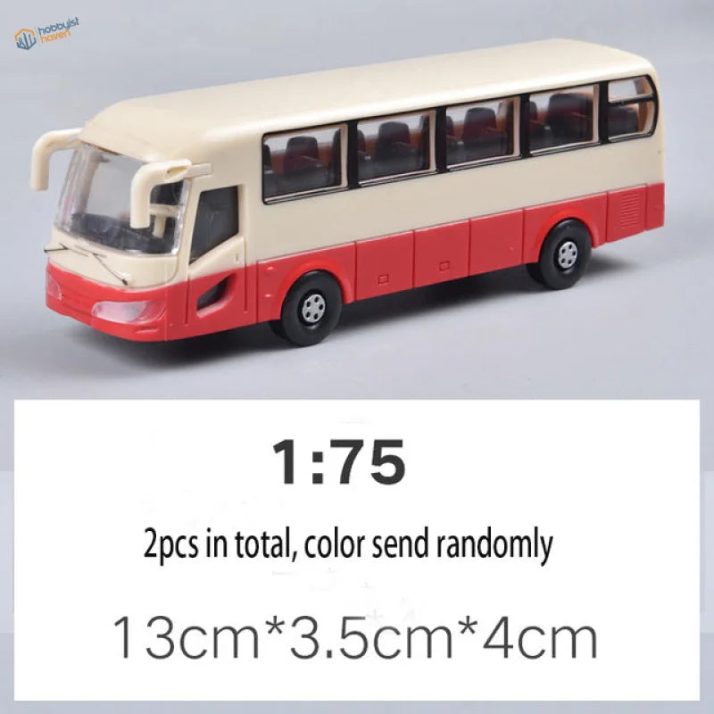 Cream and red two-tone die-cast toy bus model.