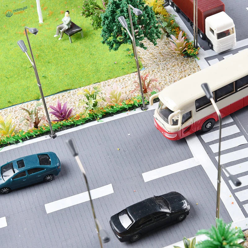 Red and cream toy bus with white roof for scale railway modeling 1:75-1:200