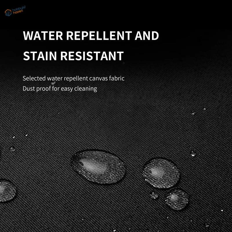 Water-resistant canvas apron with black textured fabric repelling droplets